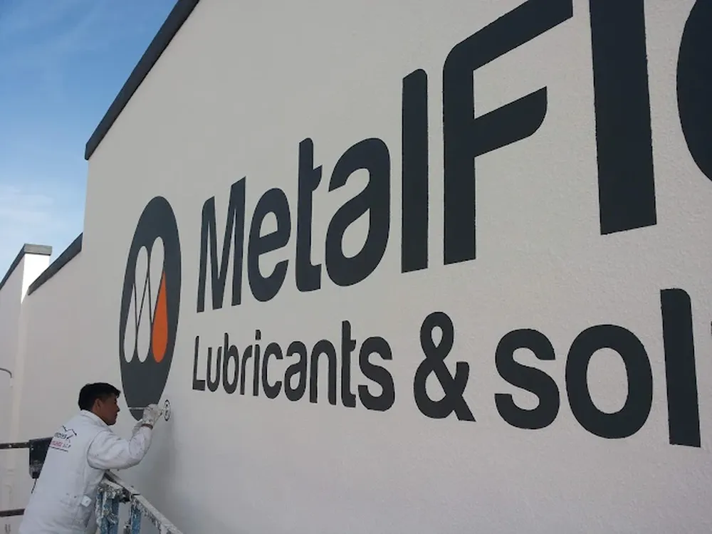 Rotulación pintada de marcas de empresa - Pintores González